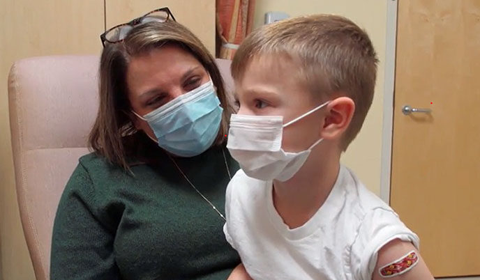 A child who has received a vaccine at the doctor's office