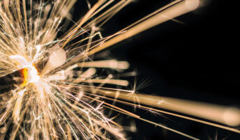 Close up of a lit sparkler at night