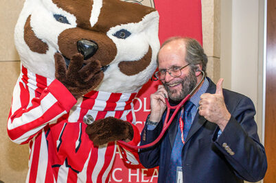 Dean Robert N. Golden with Bucky Badger