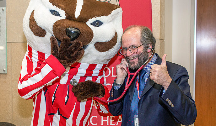 Dean Robert N. Golden with Bucky Badger