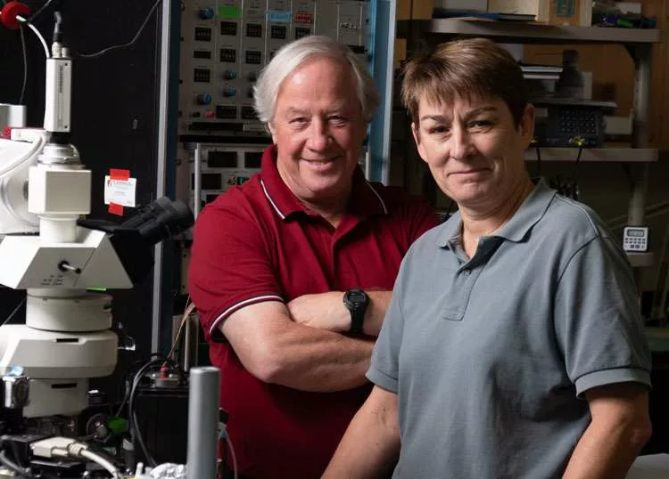 Robert Fettiplace and Maryline Beurg in their lab